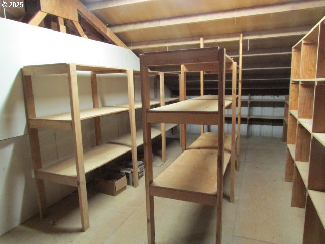 10285 South Rosewood Way Molalla, OR 97038 - Photo 37 of 39 a view of a room with wooden floor and windows
