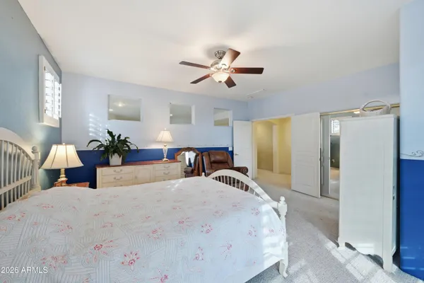 a bathroom with a sink vanity and a mirror
