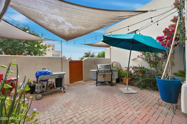a view of a chairs and tables in patio