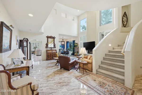 a kitchen with stainless steel appliances granite countertop sink stove and cabinets
