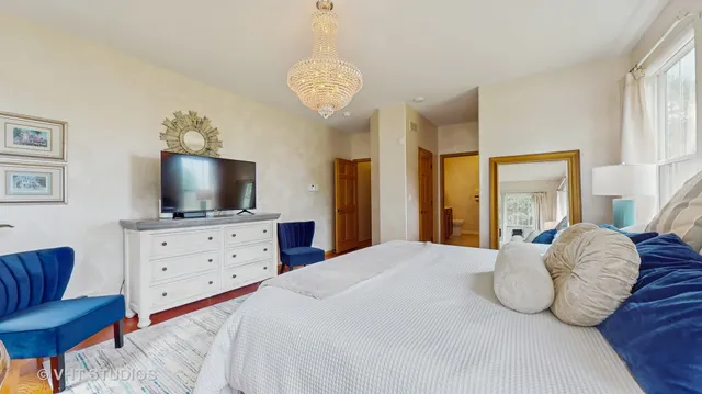 a kitchen with stainless steel appliances granite countertop a stove a sink dishwasher and a refrigerator