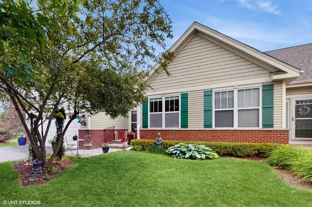 a view of a hallway with seating area
