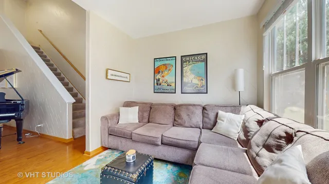 a room with furniture and pool table
