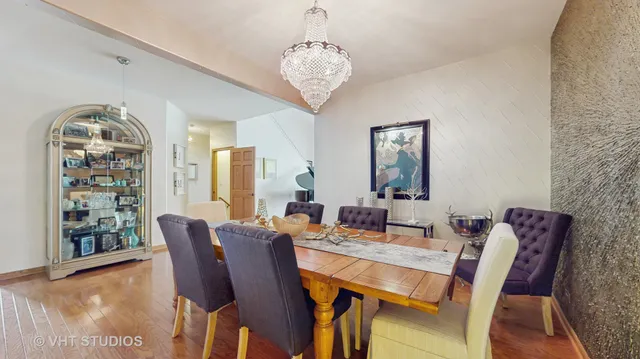 a bedroom with a bed and a flat screen tv in it