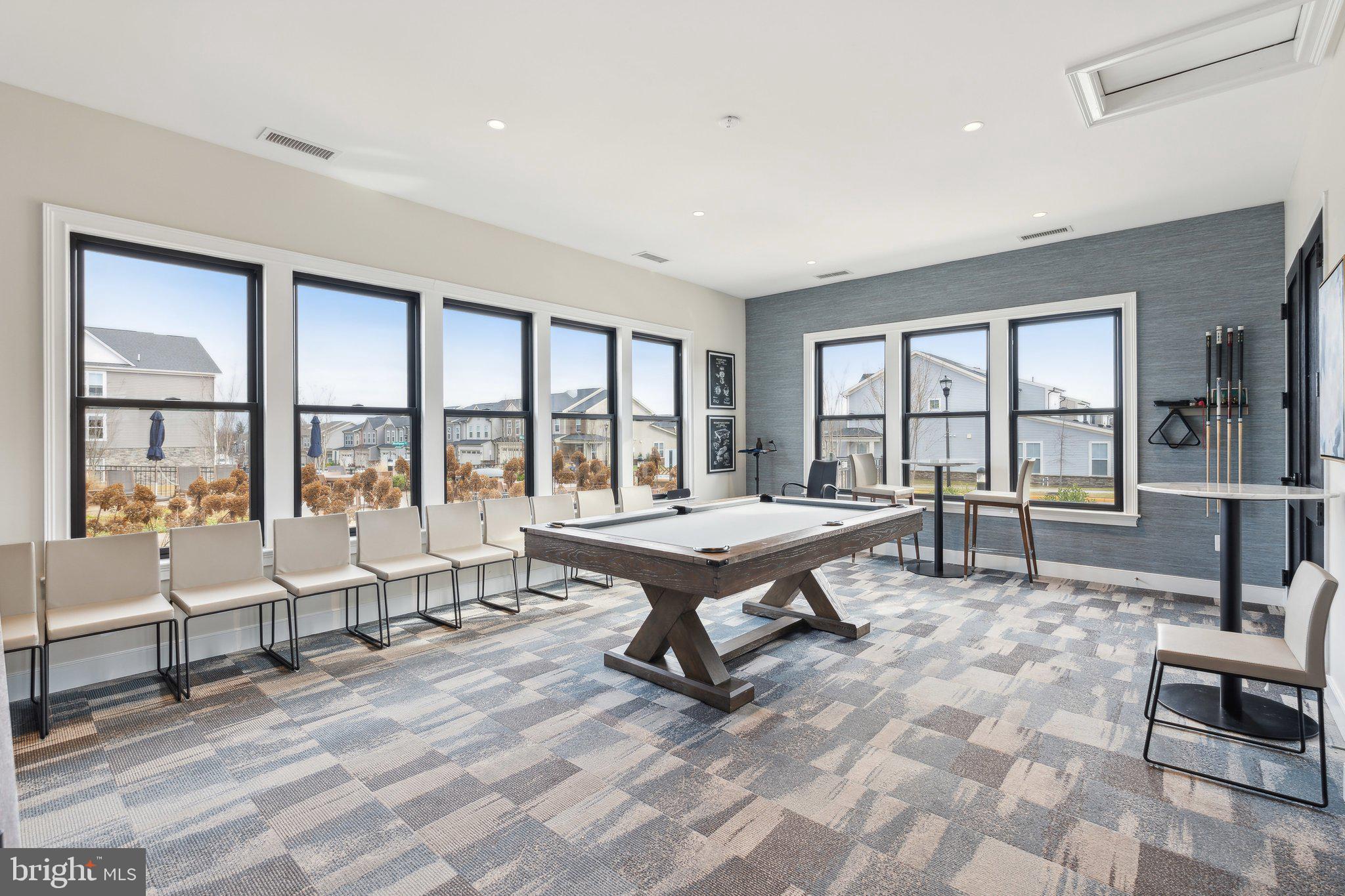 248 Violet Way, Unit 2 Stafford, VA 22554 - Photo 29 of 41 a living room with furniture a rug and a floor to ceiling window