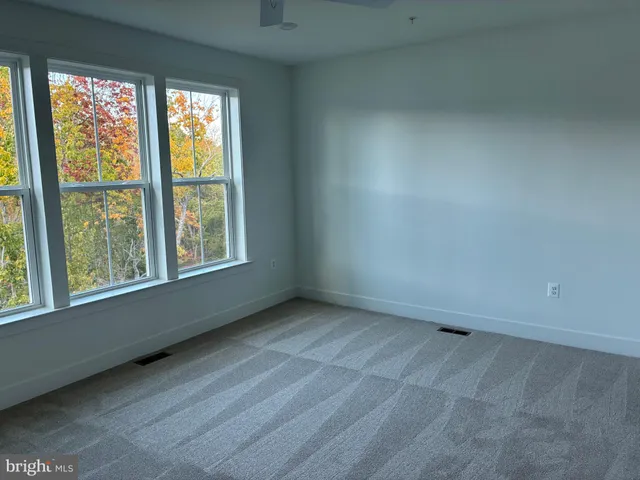 a bathroom with a double vanity sink toilet and shower