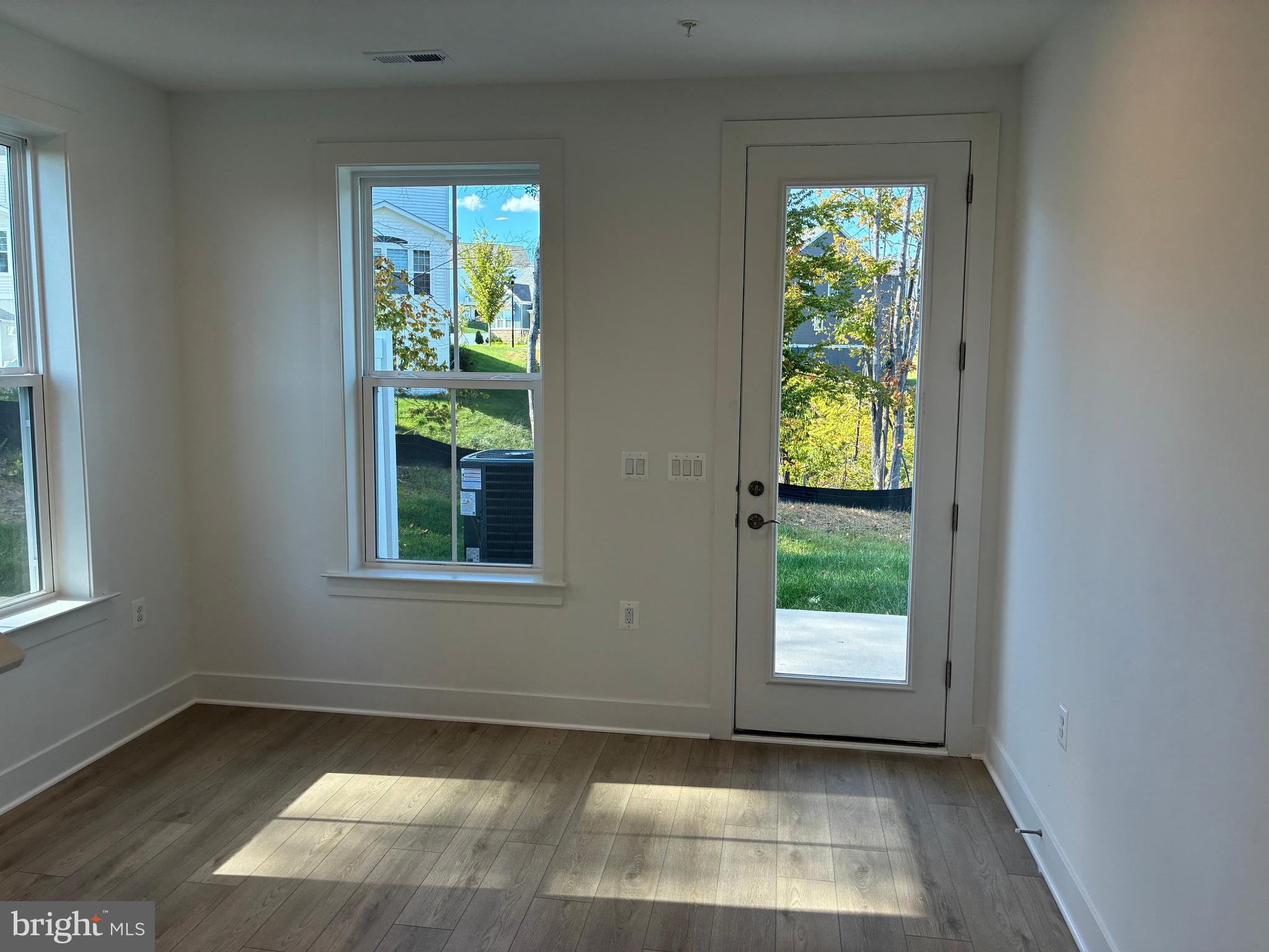 248 Violet Way, Unit 2 Stafford, VA 22554 - Photo 9 of 41 an empty room with windows
