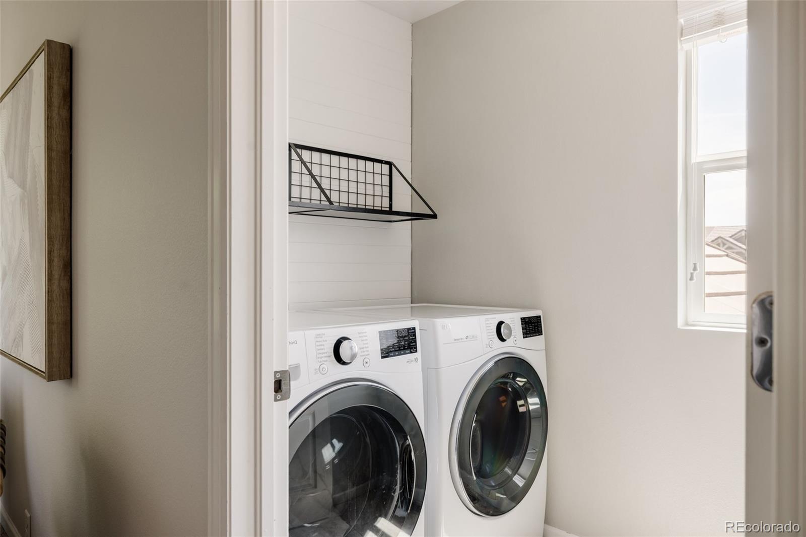 2899 Trinity Loop Broomfield, CO 80023 - Photo 24 of 33 a utility room with dryer and washer