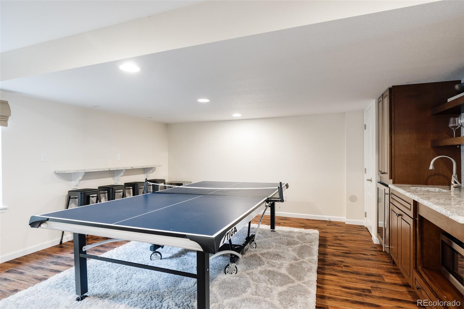 2899 Trinity Loop Broomfield, CO 80023 - Photo 26 of 33 a view of a kitchen with a table and chairs