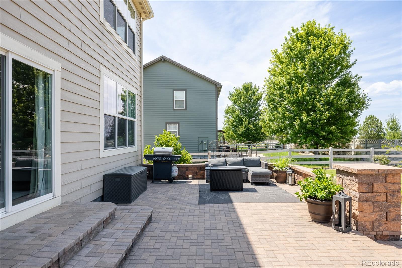 2899 Trinity Loop Broomfield, CO 80023 - Photo 31 of 33 a view of a patio with couches and plants