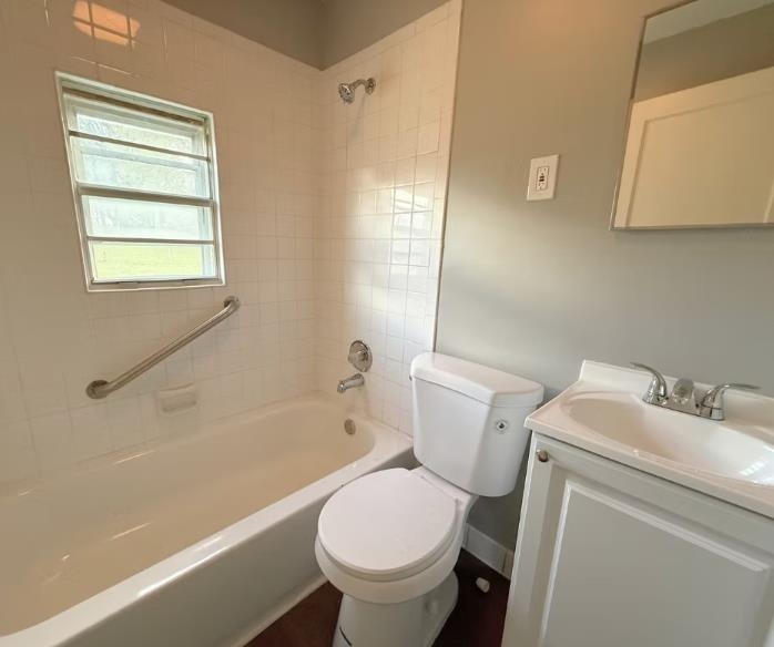 433 Dixie Road Memphis, TN 38109 - Photo 11 of 11 a white toilet sitting next to a bath tub shower