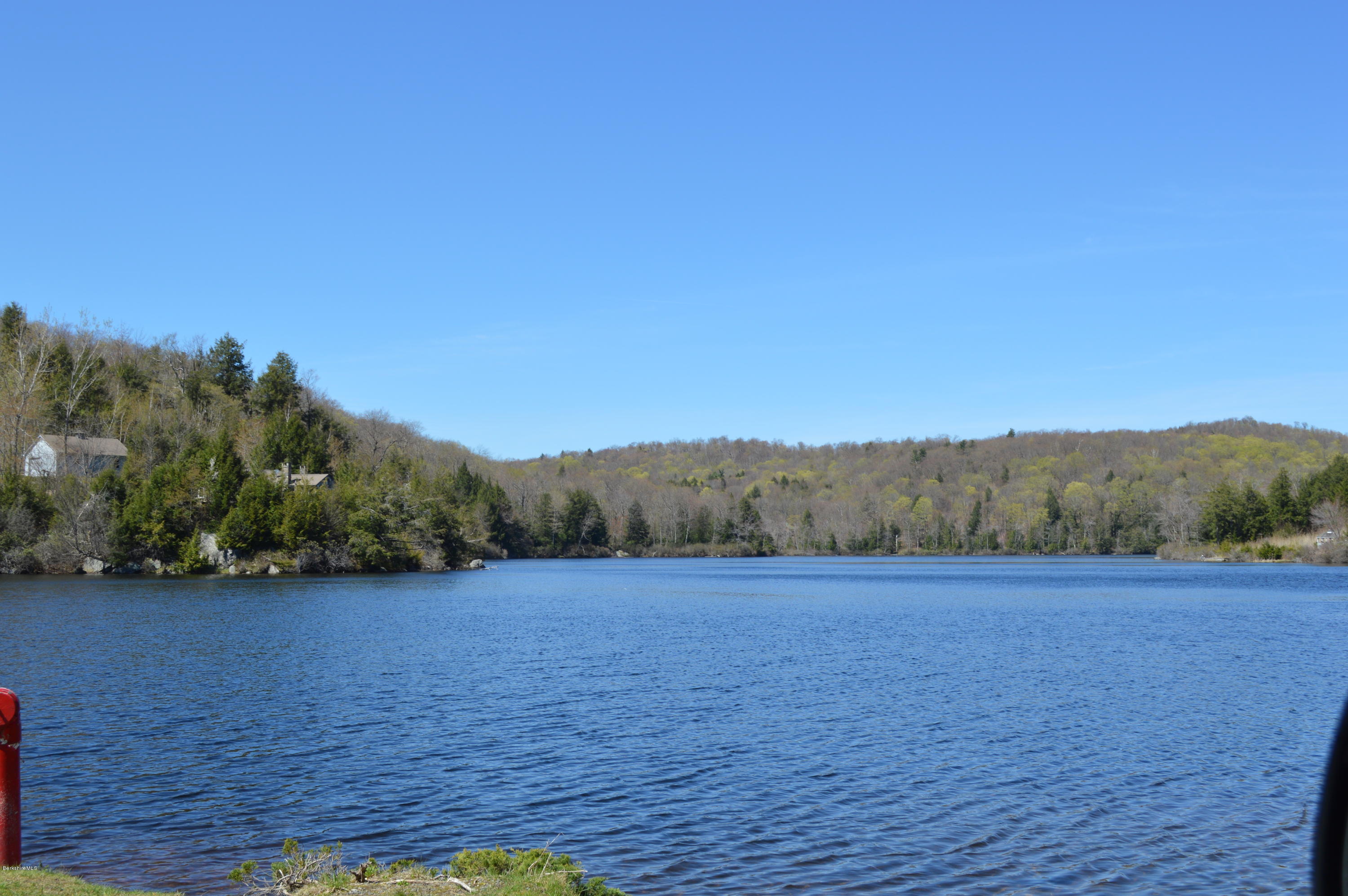 2034 West Center Road Otis, MA 01253 - Photo 13 of 50 a view of a backyard with wooden floor and mountain view
