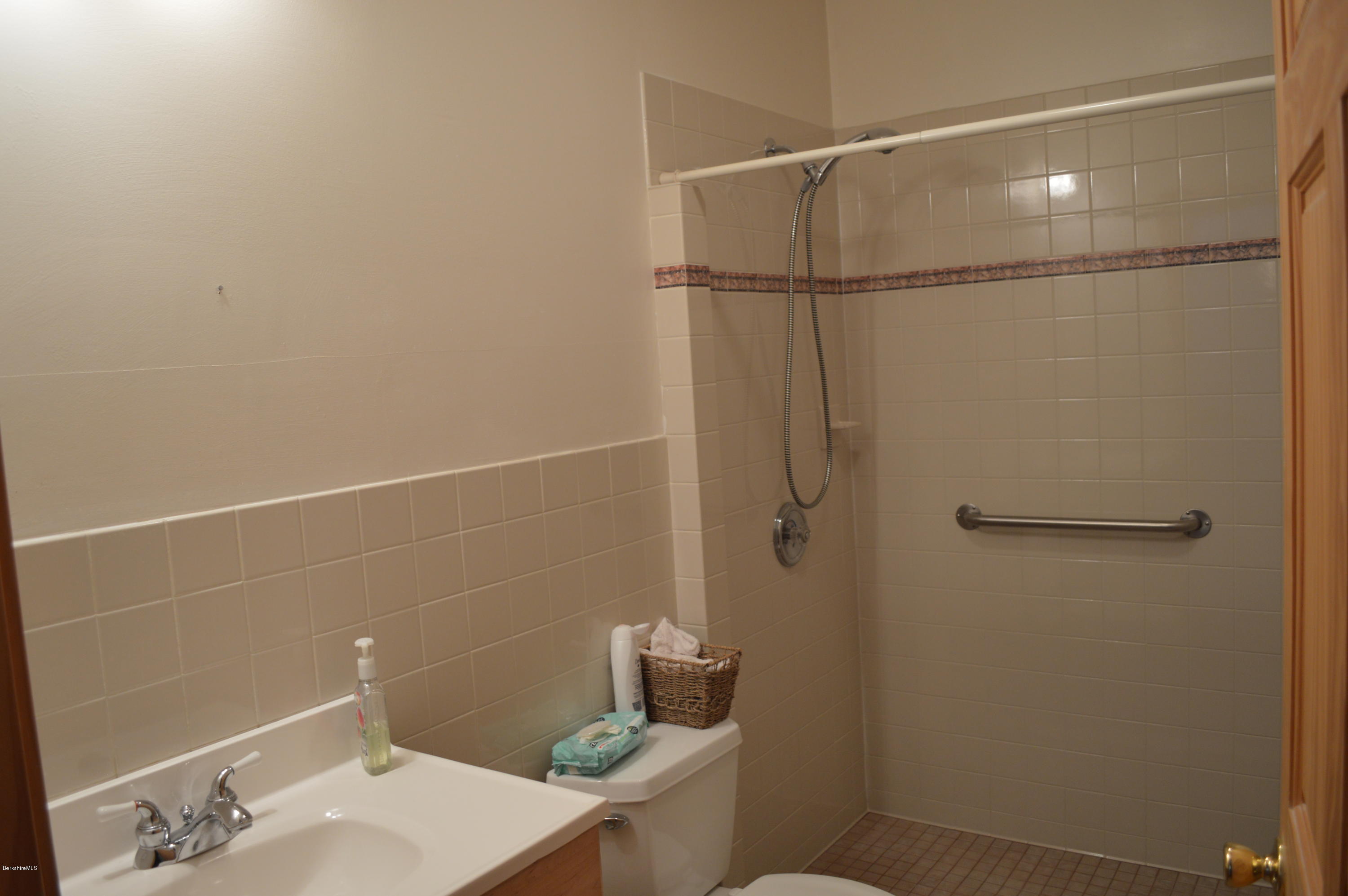 2034 West Center Road Otis, MA 01253 - Photo 24 of 50 a bathroom with a sink and toilet