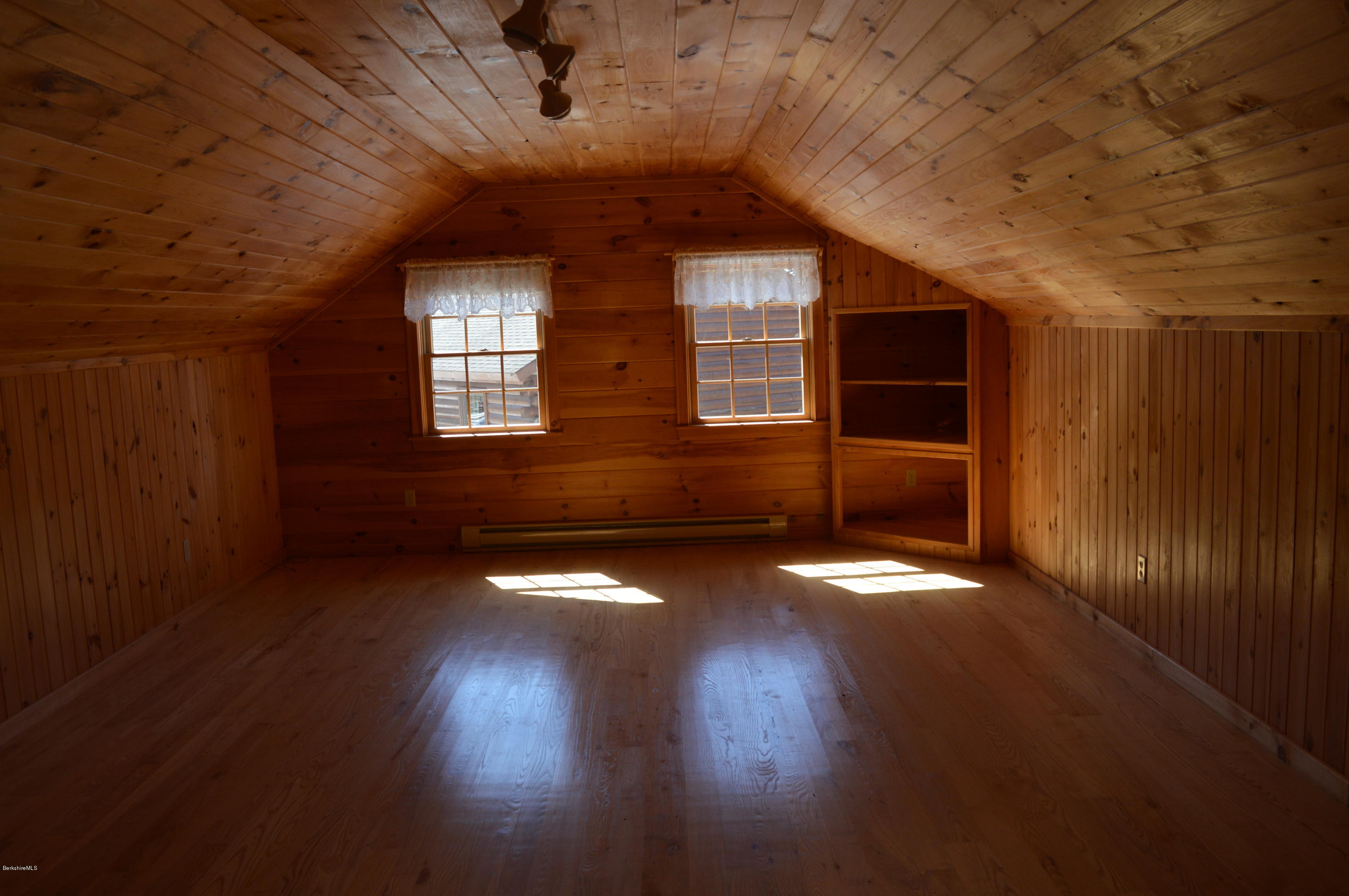 2034 West Center Road Otis, MA 01253 - Photo 27 of 50 a view of empty room with wooden floor