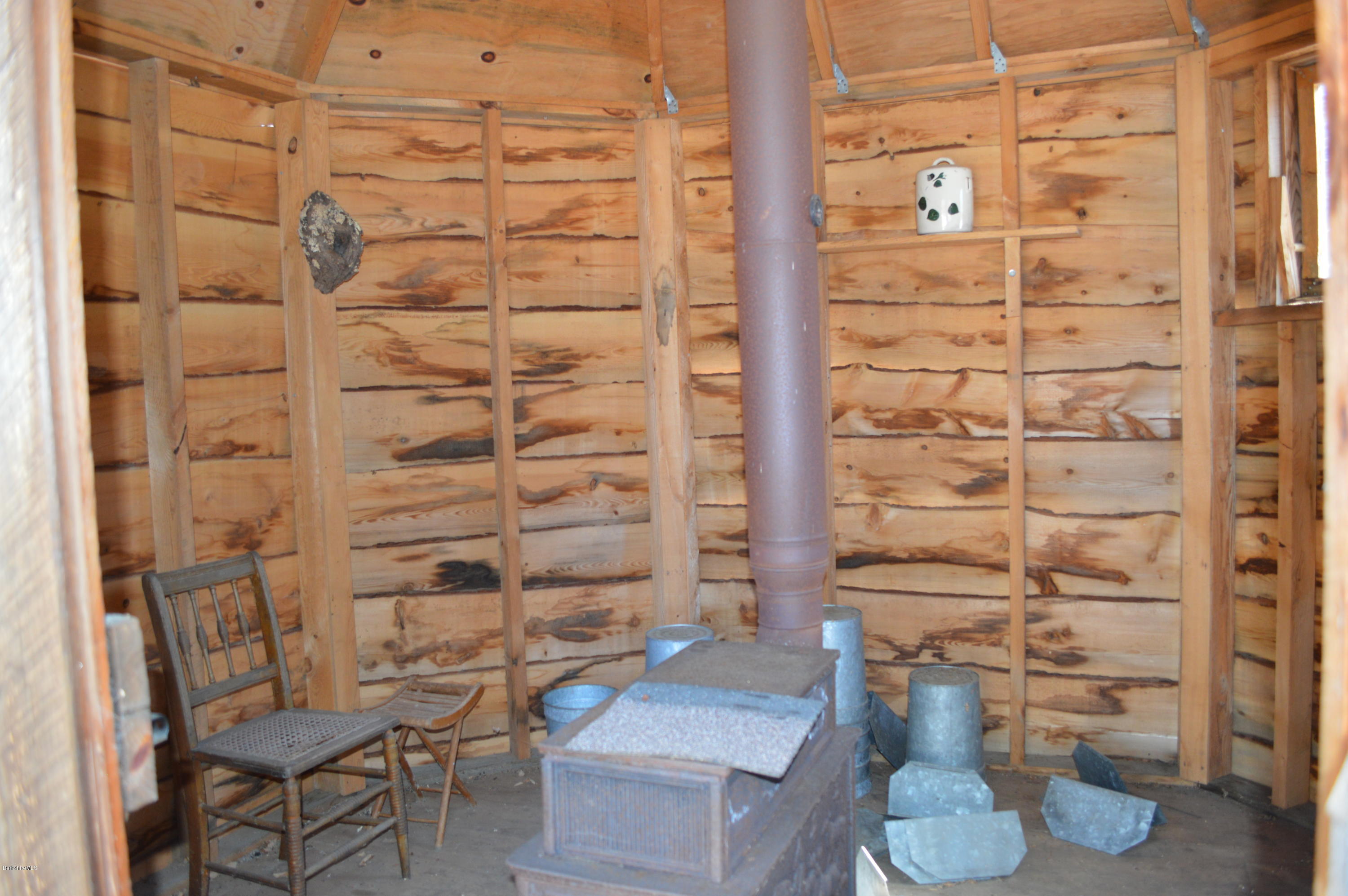 2034 West Center Road Otis, MA 01253 - Photo 38 of 50 a bathroom with a toilet and shower