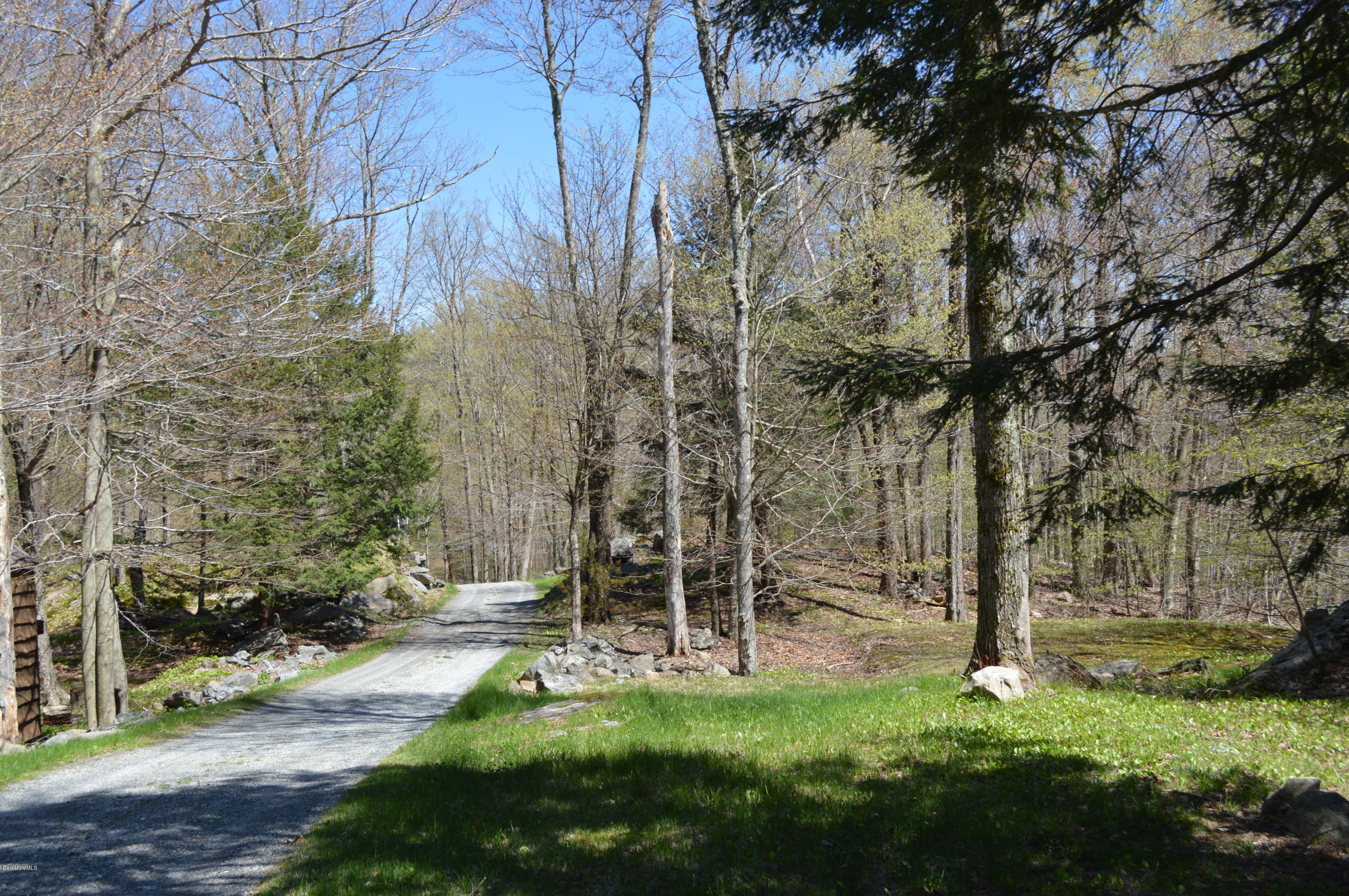 2034 West Center Road Otis, MA 01253 - Photo 43 of 50 a view of a backyard with sitting area