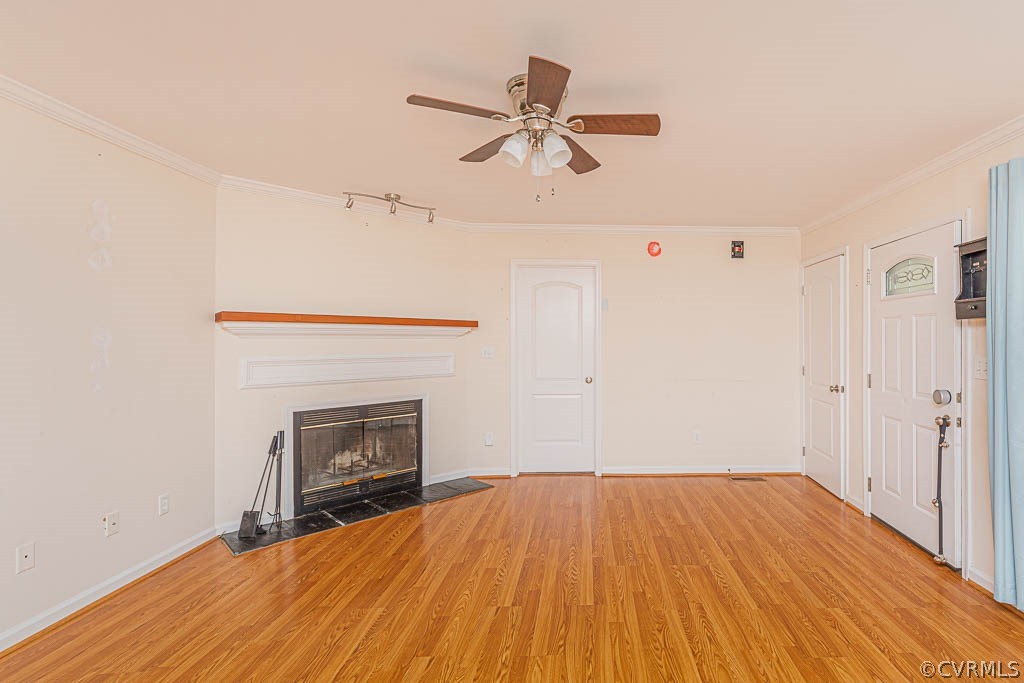 86 Riverside Drive Palmyra, VA 22963 - Photo 3 of 21 a view of empty room with wooden floor and fireplace