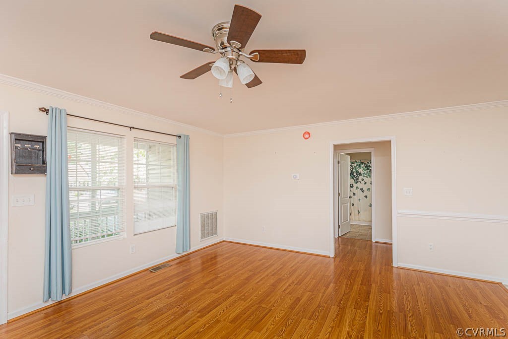 86 Riverside Drive Palmyra, VA 22963 - Photo 5 of 21 a view of empty room with wooden floor and fan