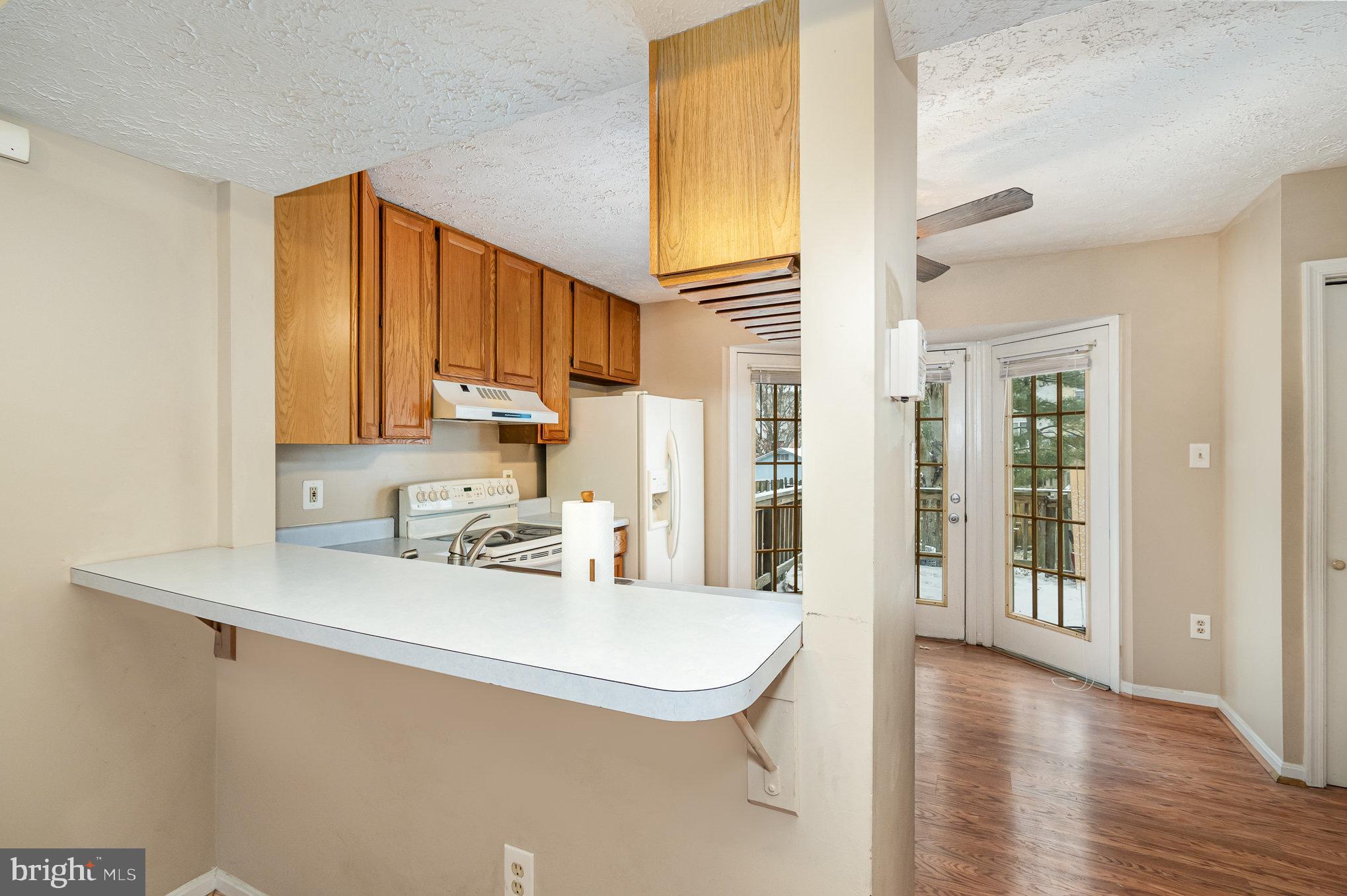 2106 Riding Crop Way Windsor Mill, MD 21244 - Photo 8 of 26 Kitchen breakfast bar
