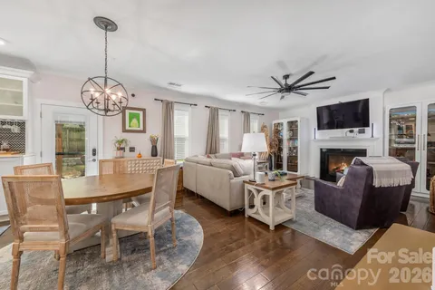 a bathroom with a shower a sink and a mirror