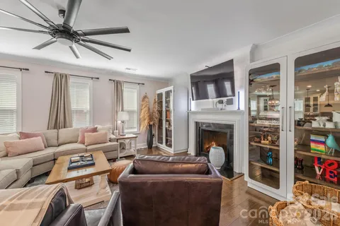 a bedroom with bed and a window