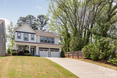 a work room with furniture and a window