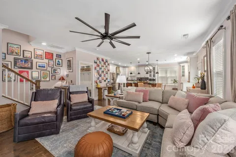 a bathroom with a double vanity sink toilet and shower