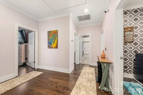 a view of backyard with sitting area