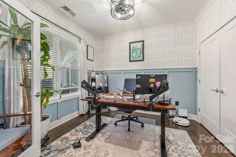 a bathroom with a granite countertop toilet sink and shower