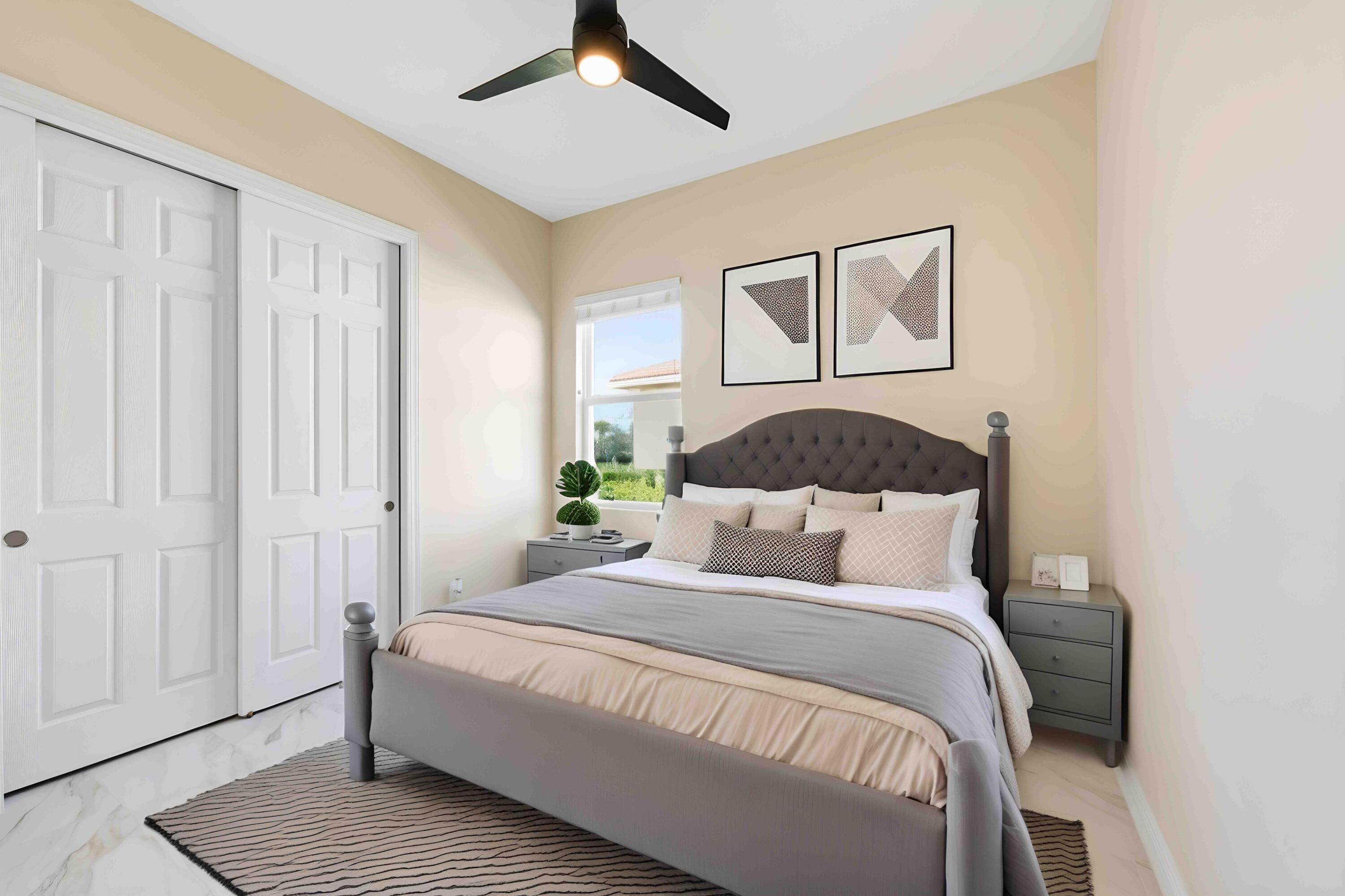 11473 Southwest Visconti Way Port St. Lucie, FL 34986 - Photo 21 of 69 a bedroom with a bed and wooden floor