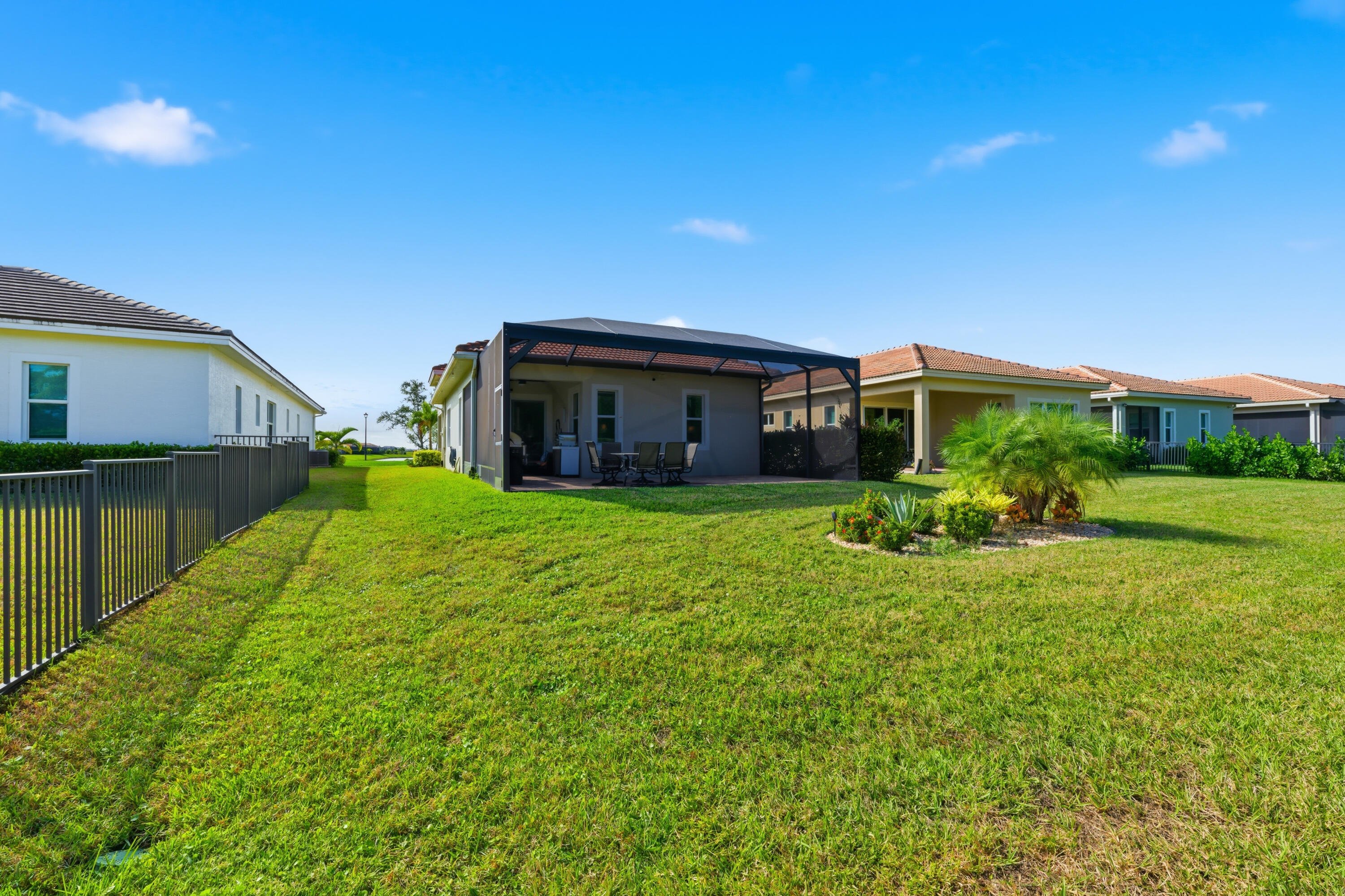 11473 Southwest Visconti Way Port St. Lucie, FL 34986 - Photo 26 of 69 a house view with a garden space