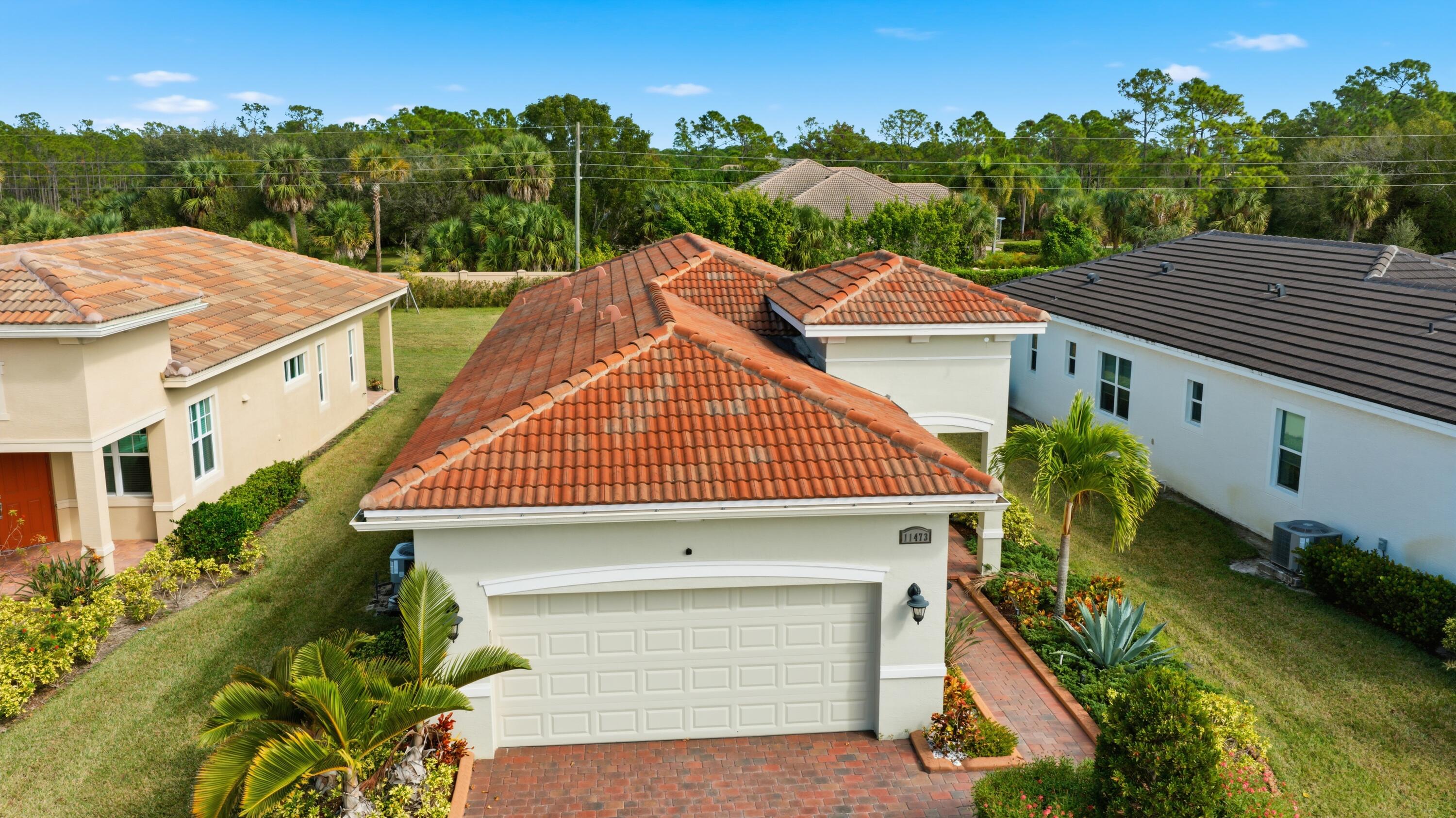 11473 Southwest Visconti Way Port St. Lucie, FL 34986 - Photo 33 of 69 an aerial view of a house