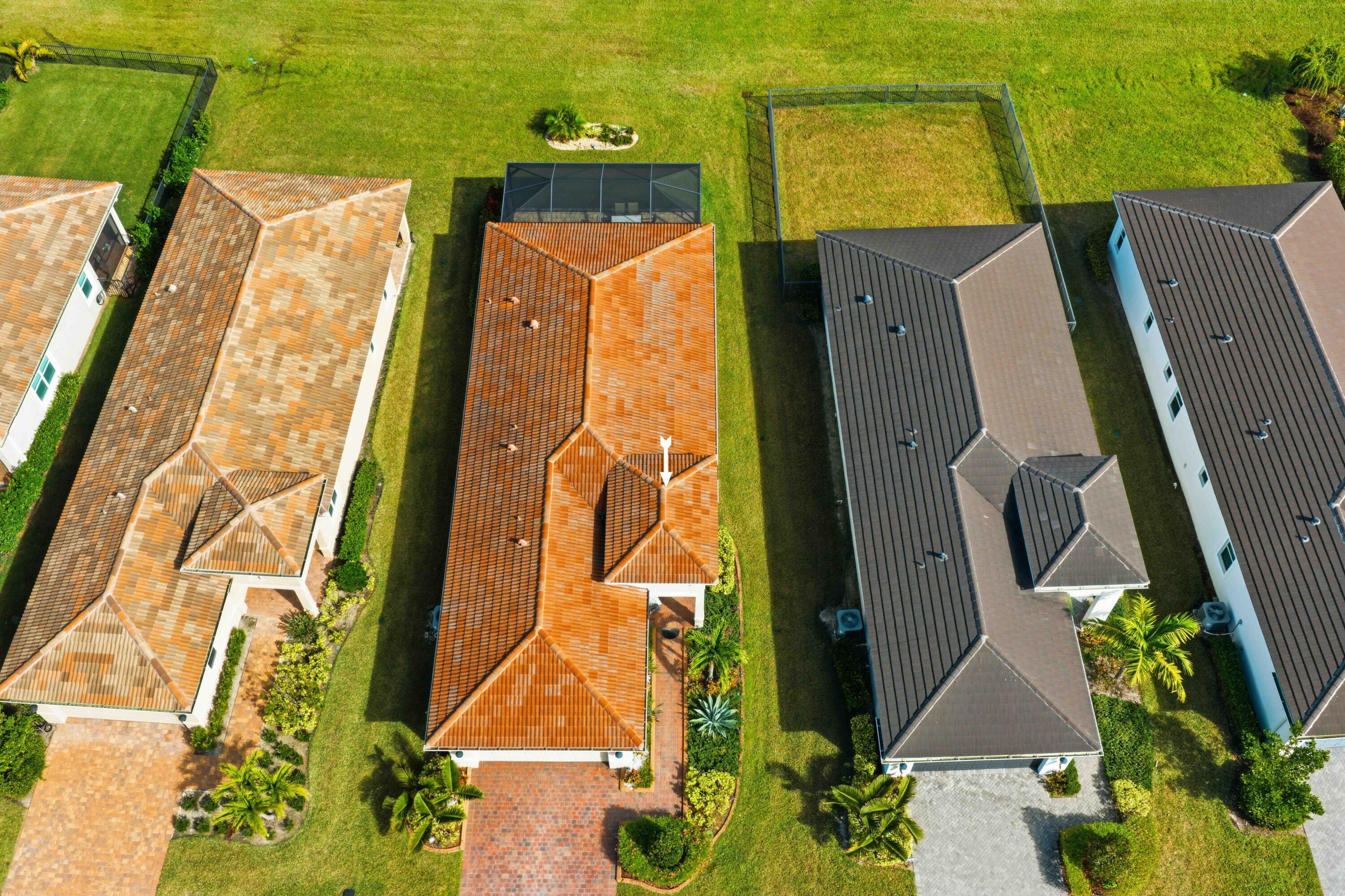 11473 Southwest Visconti Way Port St. Lucie, FL 34986 - Photo 38 of 69 an aerial view of a residential apartment building with swimming pool