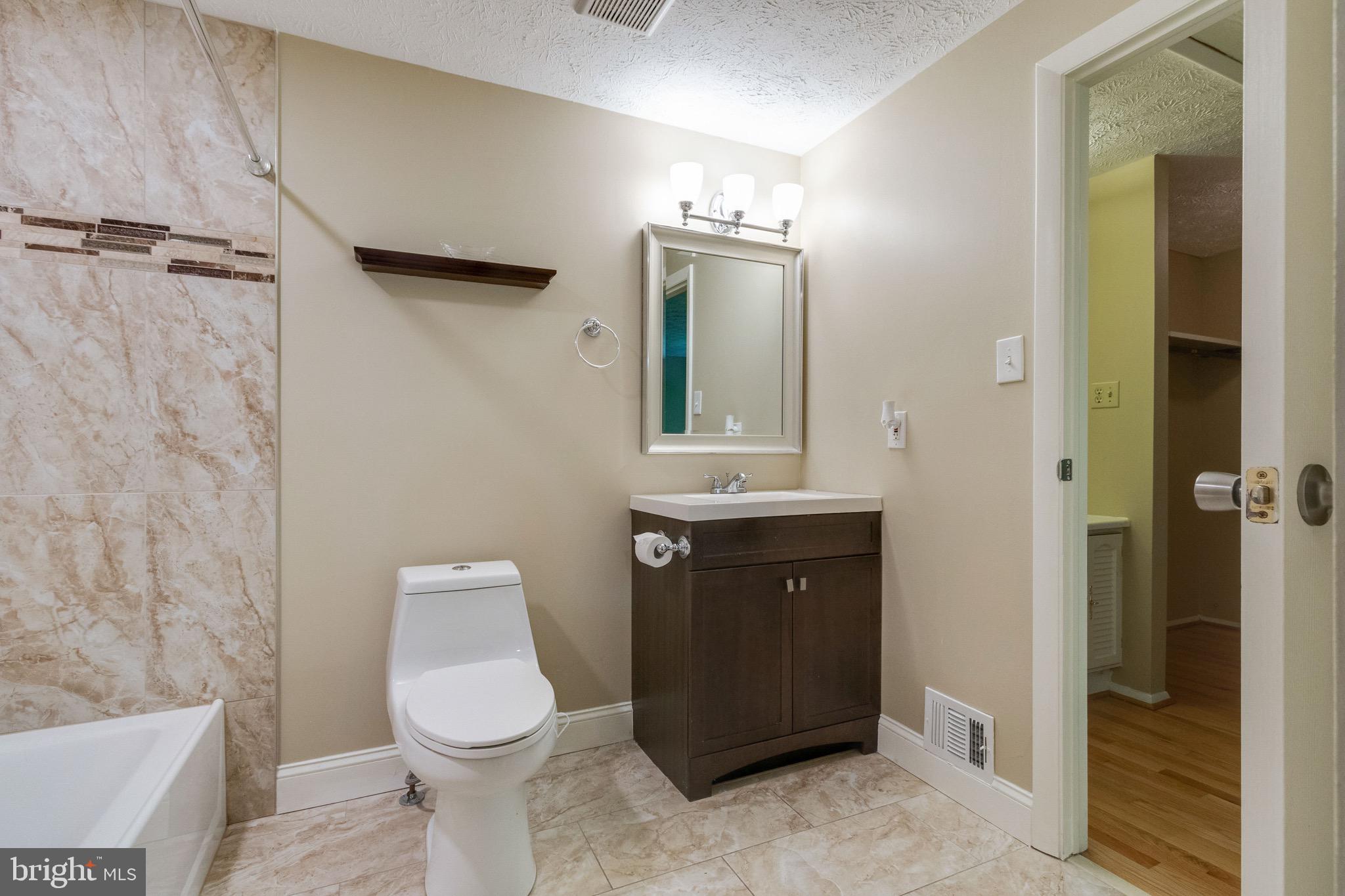 8044 Steeple Chase Court Springfield, VA 22153 - Photo 17 of 25 Renovated Full Bathroom