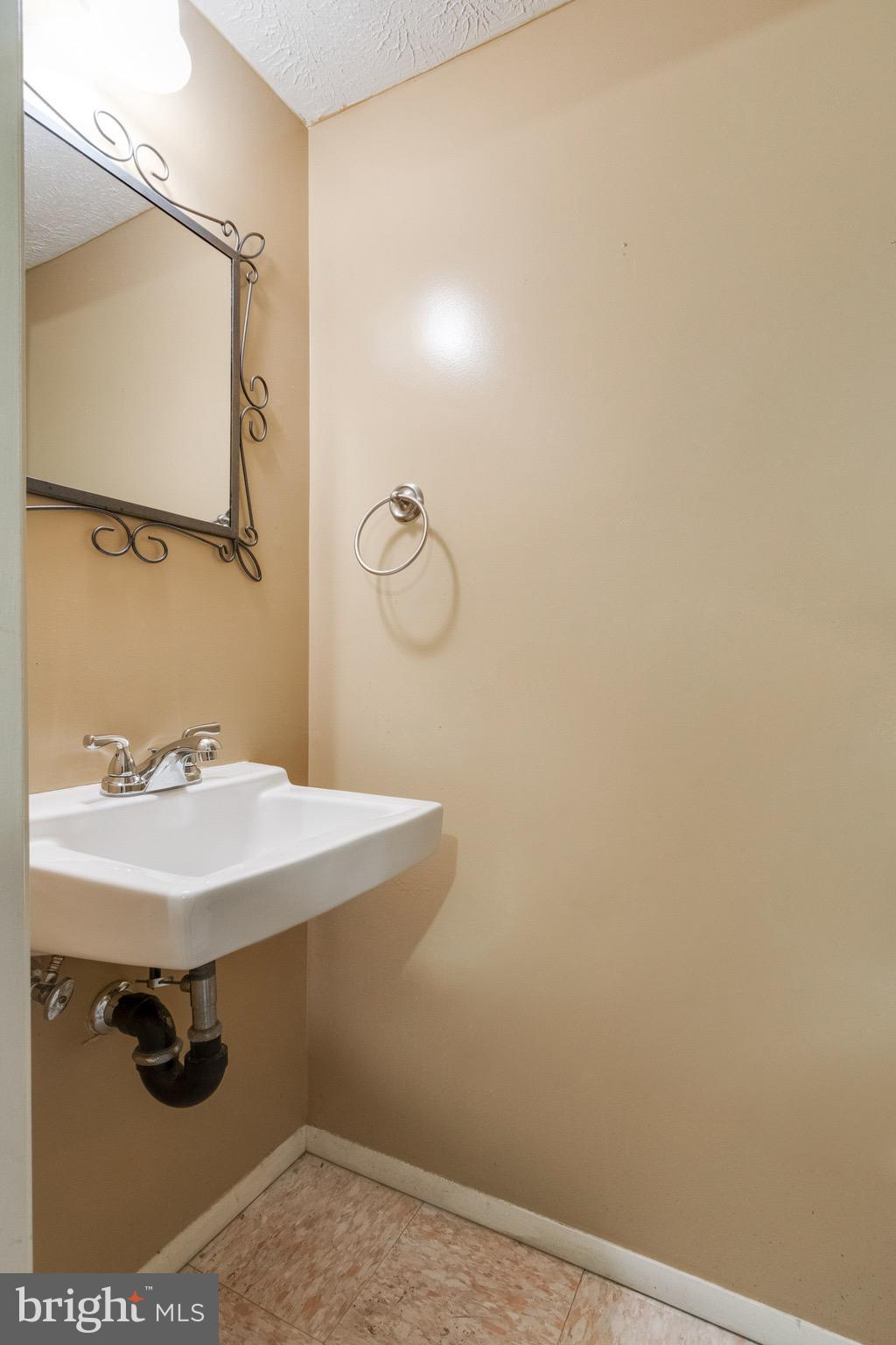 8044 Steeple Chase Court Springfield, VA 22153 - Photo 21 of 25 Half Bathroom on Lower Level