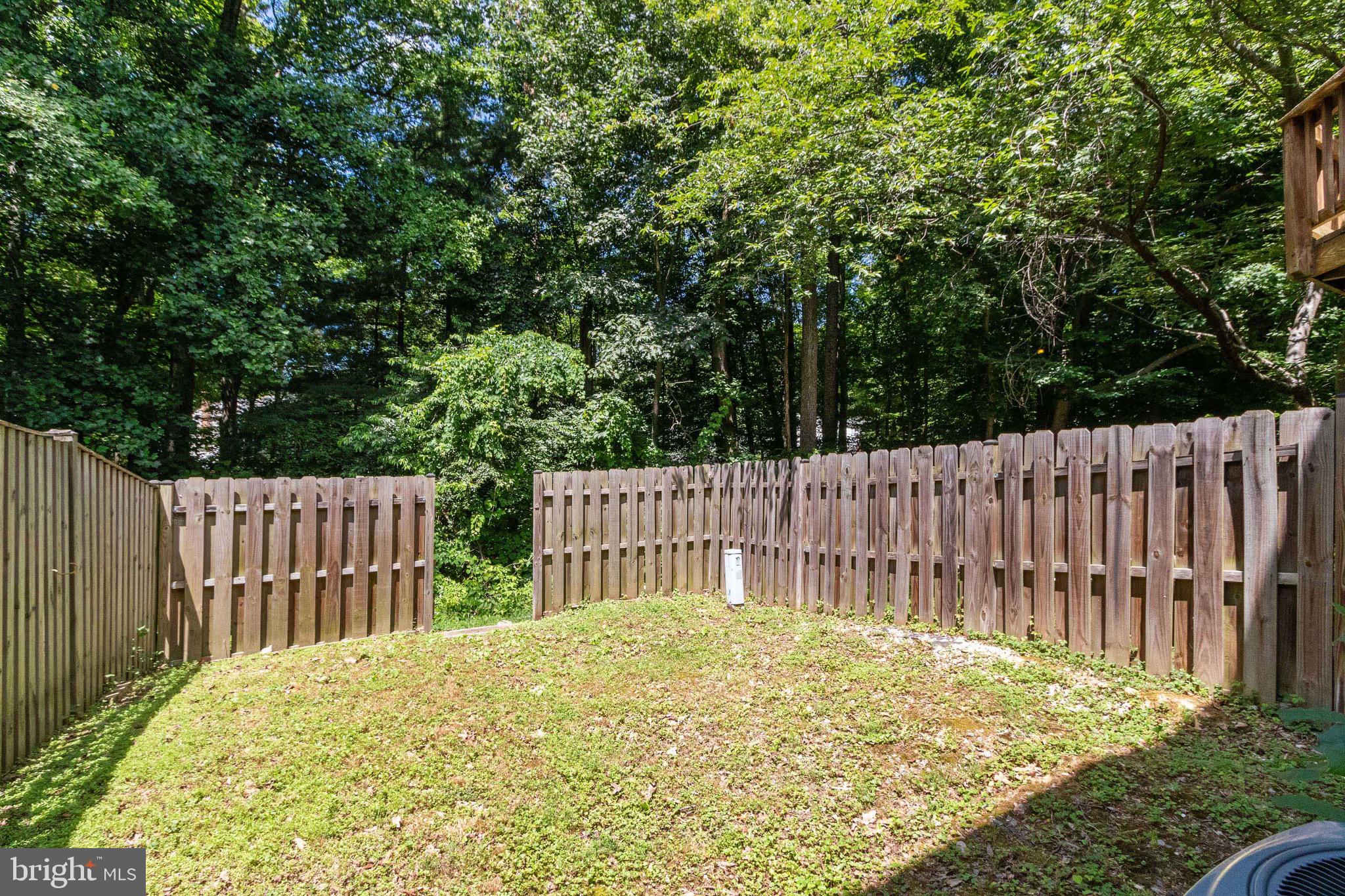 8044 Steeple Chase Court Springfield, VA 22153 - Photo 23 of 25 Fully Fenced Backyard with Gate