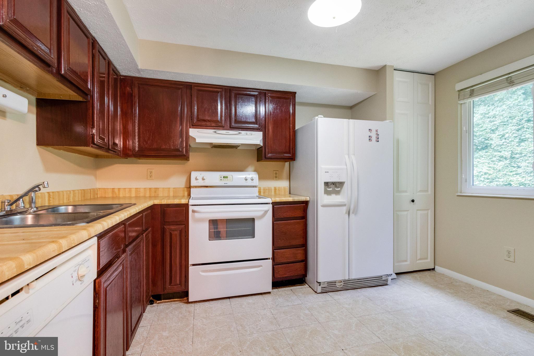 8044 Steeple Chase Court Springfield, VA 22153 - Photo 6 of 25 Nicely Sized Kitchen with Pantry