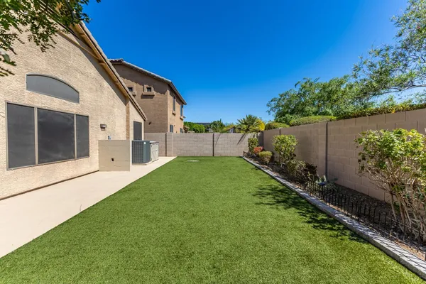 a view of a back yard of the house