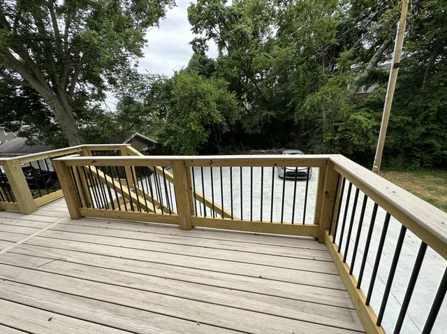 a view of deck with seating and yard