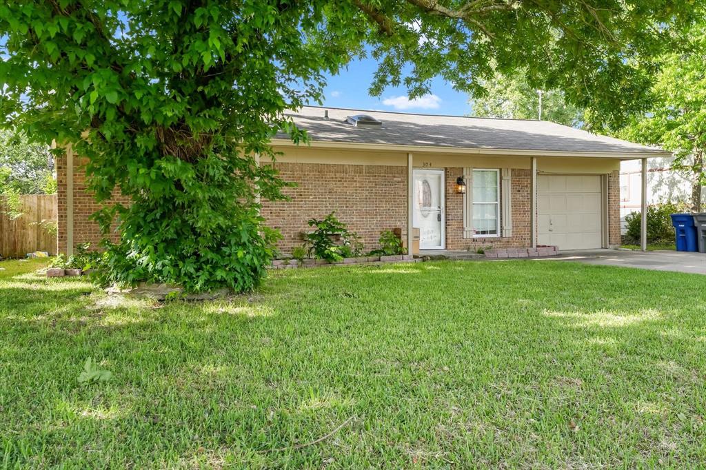 304 East Stone Road Wylie, TX 75098 - Photo 18 of 19 a view of a house with garden and yard