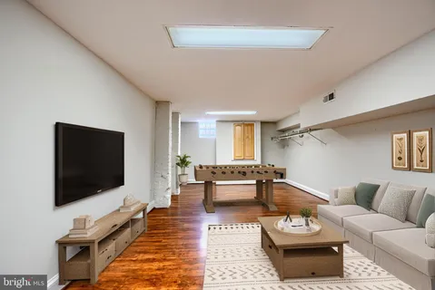 a bed room with a bed and a chair