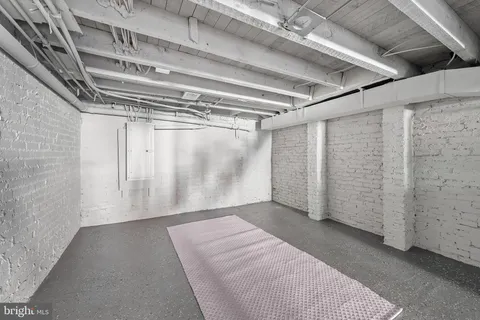 a view of a room with wooden walls