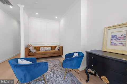 a living room with furniture and a couch