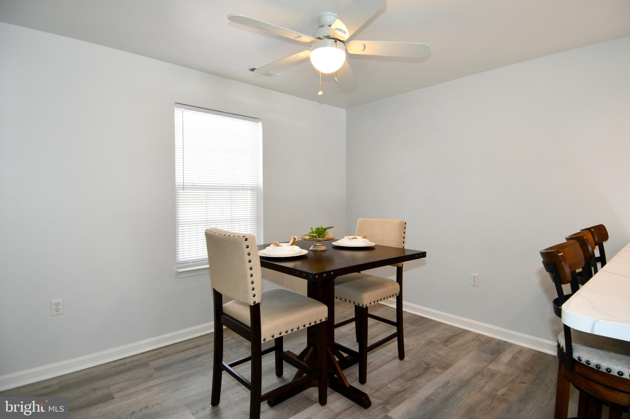 10049 Meleen Drive Faulkner, MD 20632 - Photo 19 of 56 a view of a workspace with furniture and a window