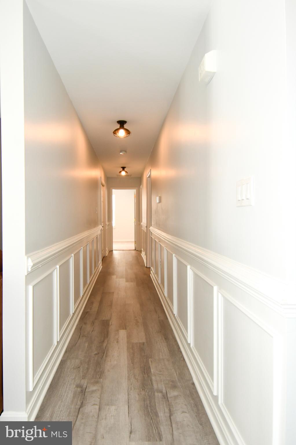 10049 Meleen Drive Faulkner, MD 20632 - Photo 24 of 56 a view of a hallway with staircase