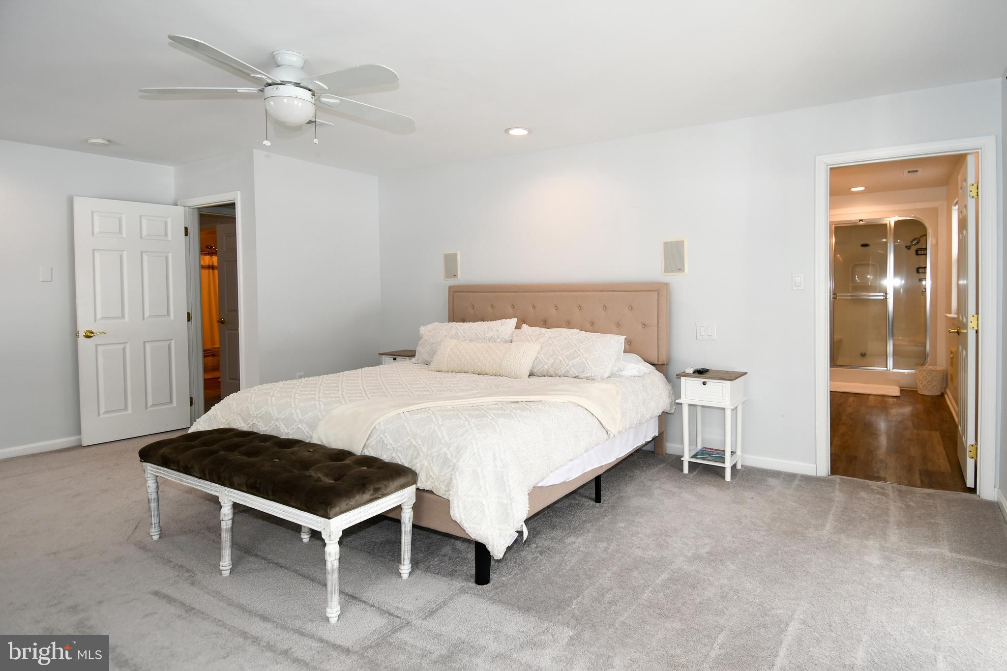 10049 Meleen Drive Faulkner, MD 20632 - Photo 33 of 56 a bedroom with a bed and a table in it