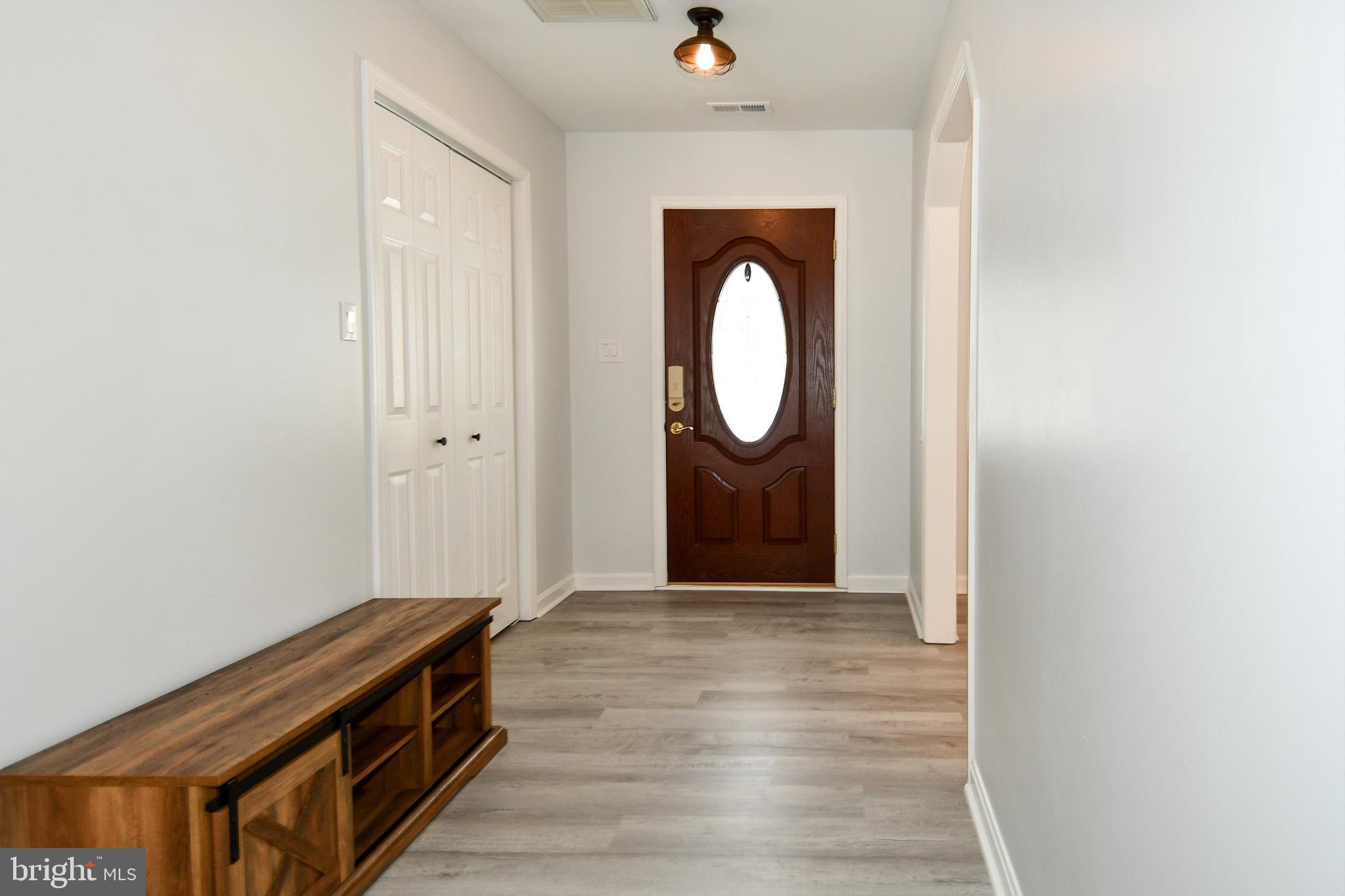 10049 Meleen Drive Faulkner, MD 20632 - Photo 4 of 56 a view of a livingroom with wooden floor
