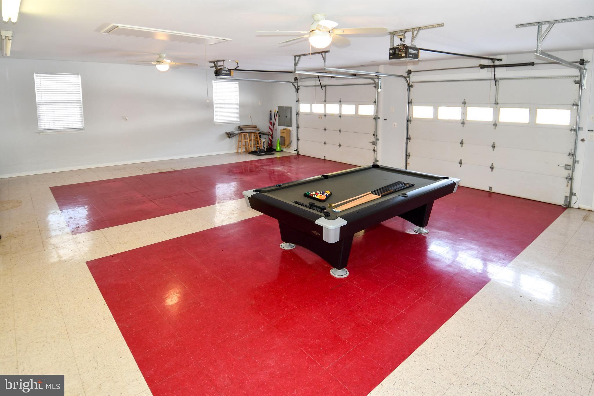 10049 Meleen Drive Faulkner, MD 20632 - Photo 48 of 56 a room with pool table and a chandelier