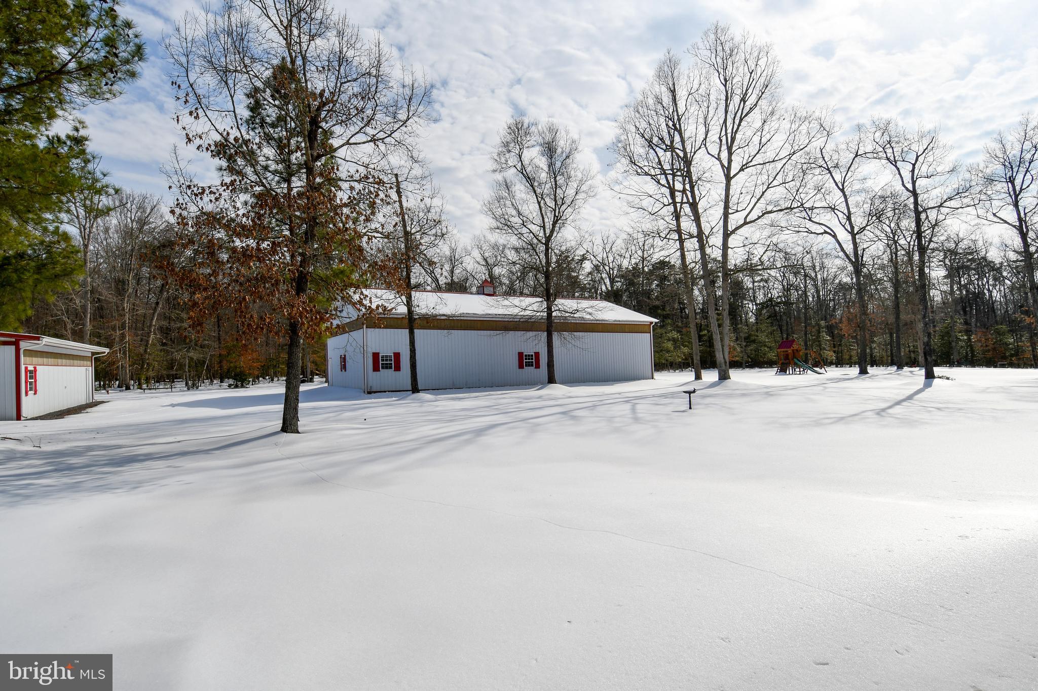 10049 Meleen Drive Faulkner, MD 20632 - Photo 52 of 56 a view of a road with a barbeque