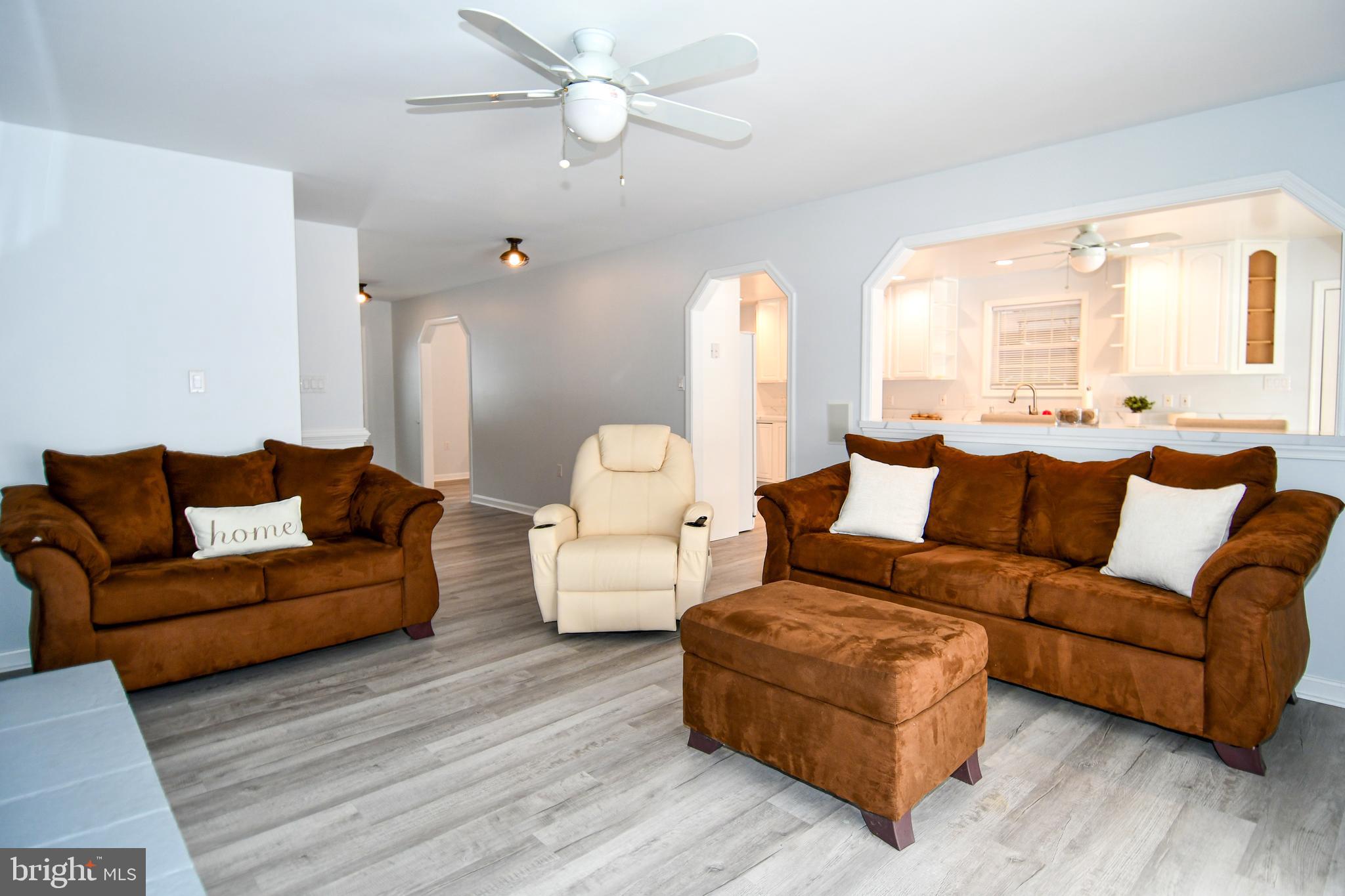 10049 Meleen Drive Faulkner, MD 20632 - Photo 9 of 56 a living room with furniture and a large window